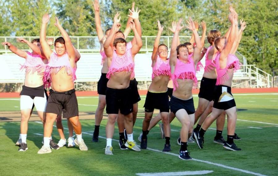 Strutting their stuff. The growlers perform at the half time show of the PowderPuff game. The growlers consisted of senior boys.