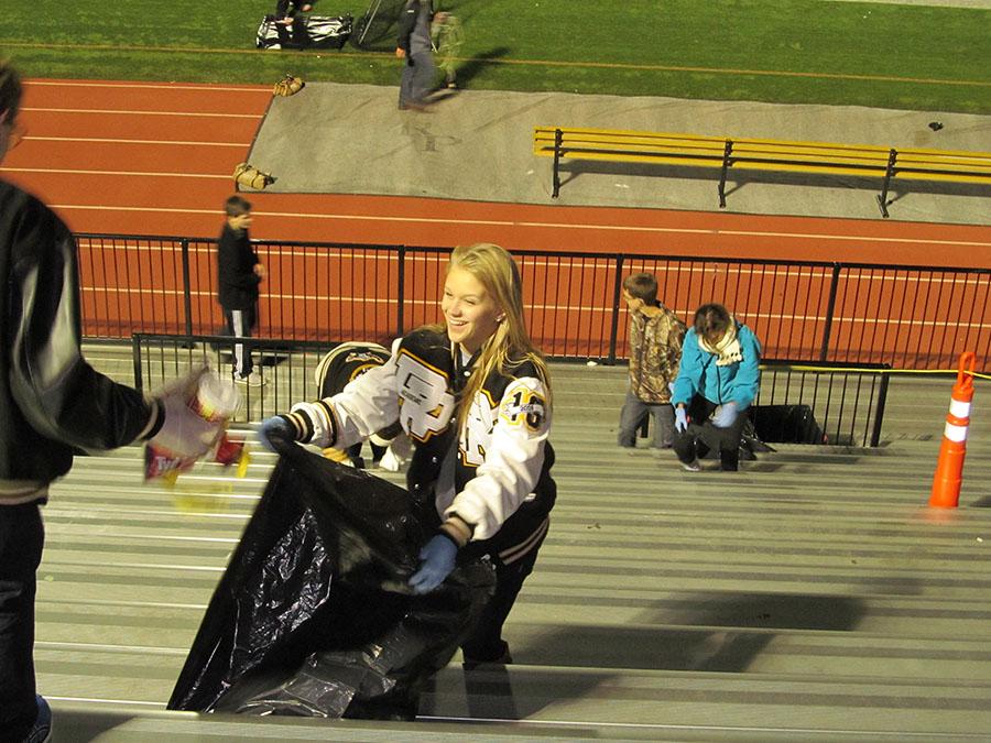 National Honor Society cleans up after football games