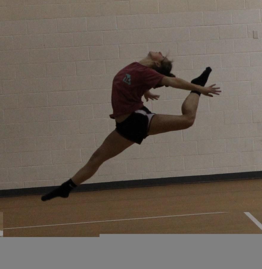 Werk.+Leaping+sophomore+Lauren+Johnson+prepares+for+the+competition+this+Saturday.+Johnson+has+been+dancing+since+she+was+3+years+old.+
