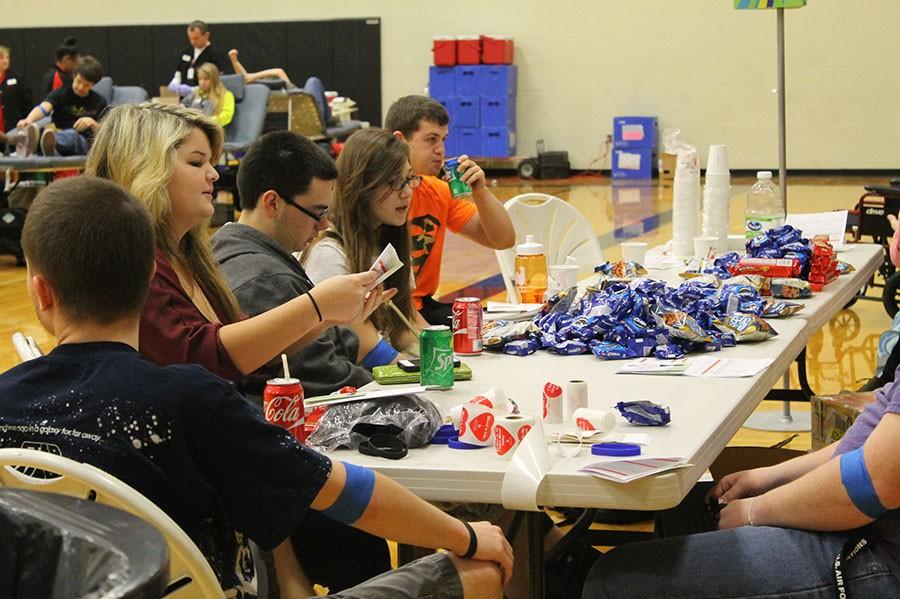 Students eat sugary foods after donating blood to the National Honor Society blood drive on 1/28.