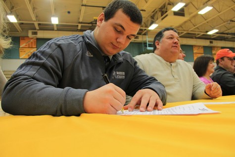 CJ Donaldson also signed for football, with Washburn University.