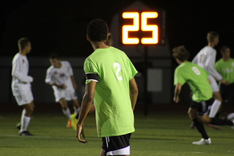 Score. Making great plays, Micah Beaver gets a goal against Lee Summit North in the first half of the game.

