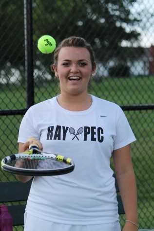 Felicia plays before a match.