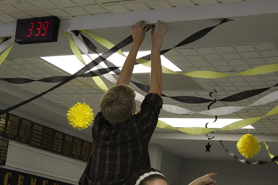 Student Senate members spend their time after school on Thursday, Sept. 17 to decorate the hallways in celebration of Homecoming. The school will be covered in black and gold colors to pump up Panther Pride for the football game on Friday, Sept. 18 as the Panthers take on St. Joseph Central Indians.