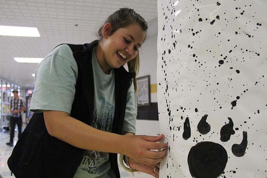 Student Senate members spend their time after school on Thursday, Sept. 17 to decorate the hallways in celebration of Homecoming. The school will be covered in black and gold colors to pump up Panther Pride for the football game on Friday, Sept. 18 as the Panthers take on St. Joseph Central Indians.