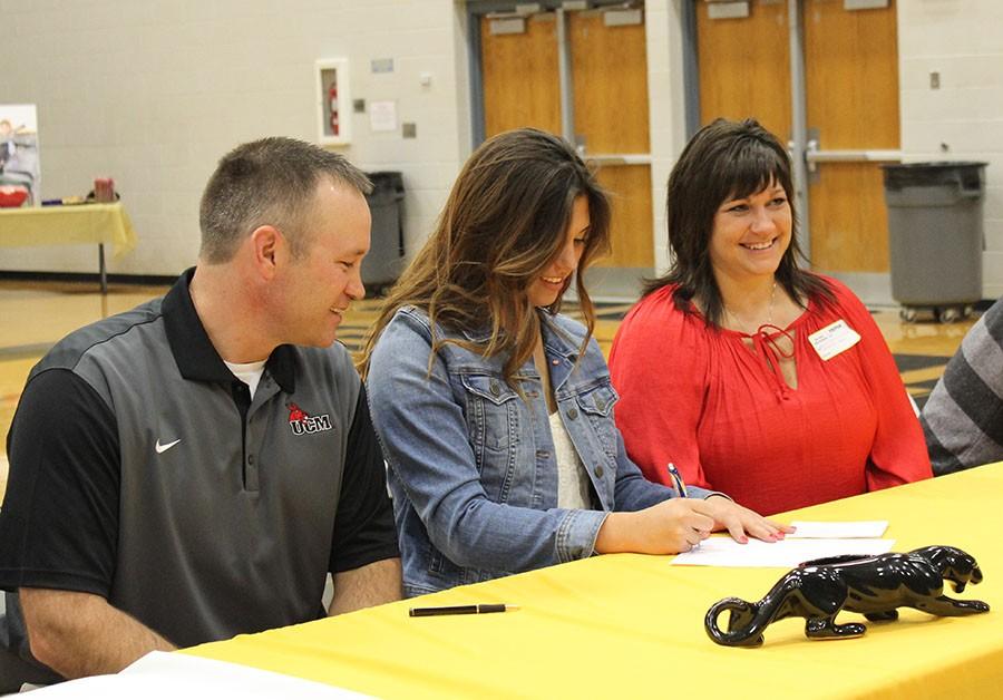 Lauryn Deer sings to play softball at the University of Central Missouri.