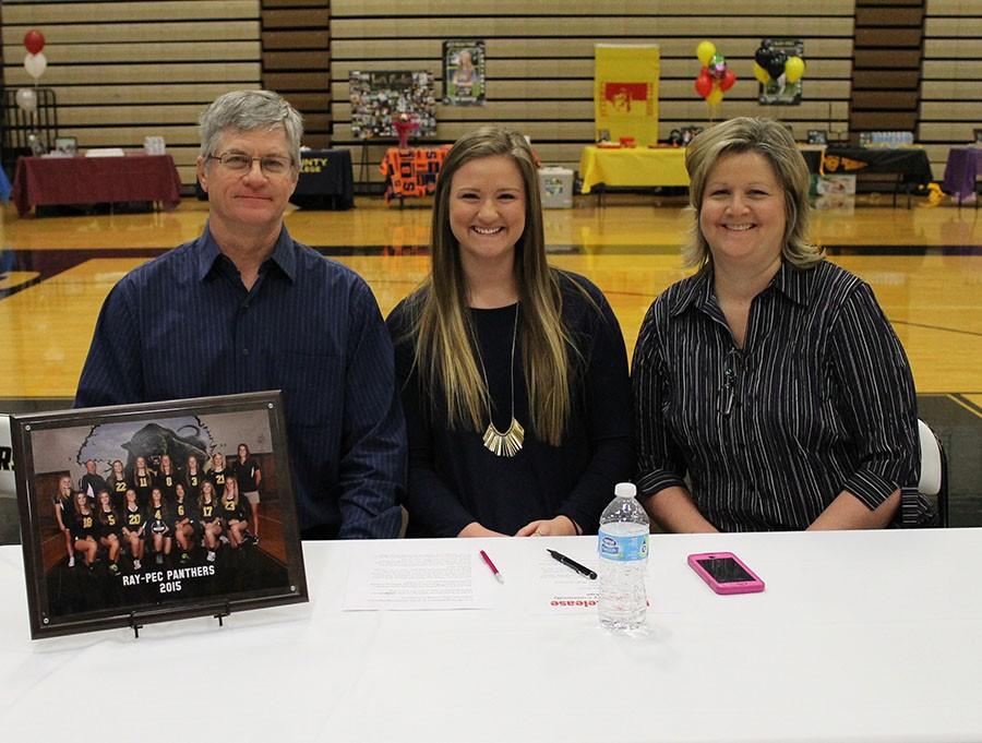 Sydney Ross signed to Johnson County Community College to continue playing volleyball.