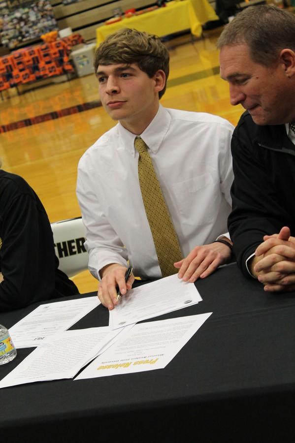 Cole Kruse signs to Missouri Western University to continue his football career.