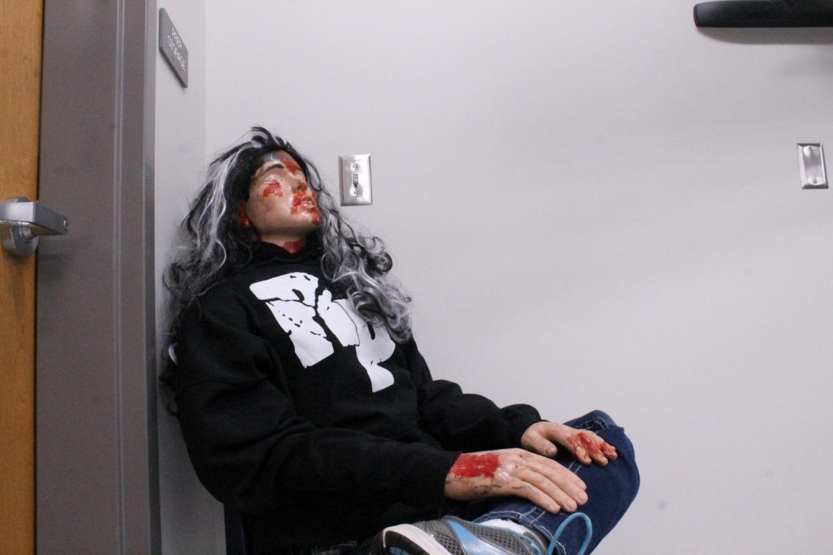 Victim. (Anna Garcia) sitting patiently for the students in the pre-biomedical class to determine her cause of death. 
