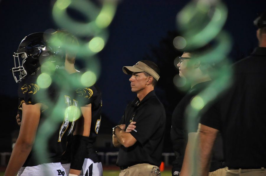 Observe. Watching the athletes’ every move at the Ray-Pec vs. Park Hill home game, Trainer Dan Schwarz keeps a close eye on the team to look for any injuries. Schwarz has to lookout for the safety of the team.