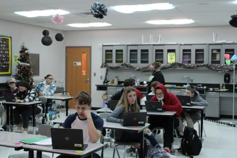 Megan Chikuru teaching one of her freshman Biology classes.